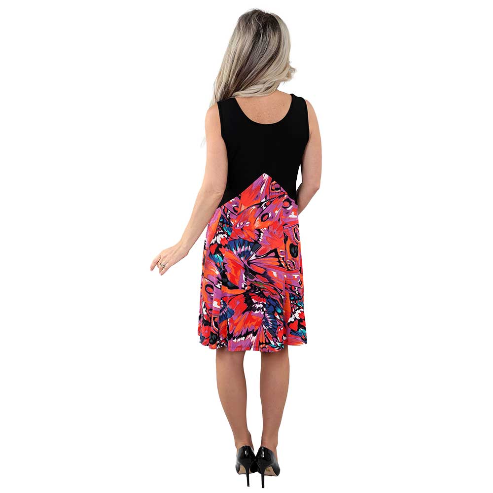 Vibrant Sleeveless Dress – A Fusion of Bold Prints and Effortless Elegance